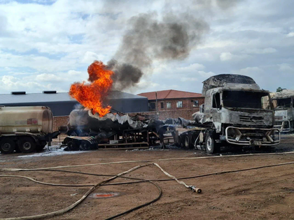 Firefighters use foam to extinguish a fuel truck fire in Benoni after a welding accident.