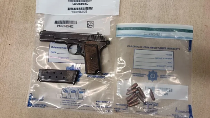 Cape Town police officers conducting a search for illegal firearms and ammunition during Easter weekend.