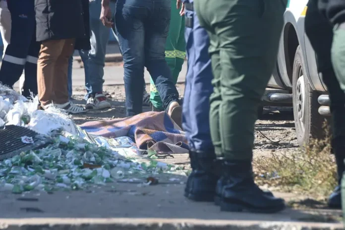Community members protesting outside Diepkloof Hostel in Gauteng