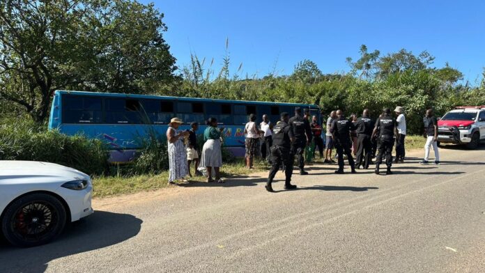 Reaction Unit officers at the scene of a fatal bus robbery in Buffelsdraai